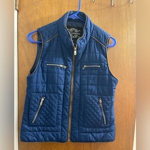 Quilted puffer vest with gold accents